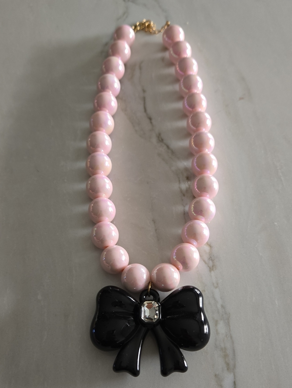 Pink Chunky Beaded Faux Pearls Necklace with Black Bow Pendant - Unbranded